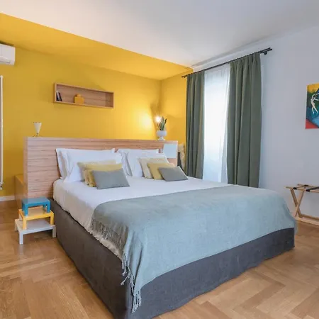 Archè Design Rooms&suites