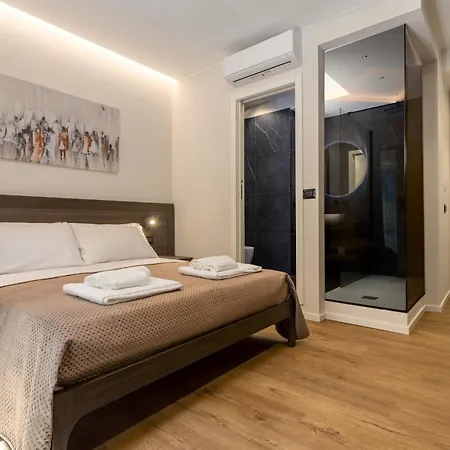 Alojamento de Acomodação e Pequeno-almoço Quinto Stabile Rooms&suite